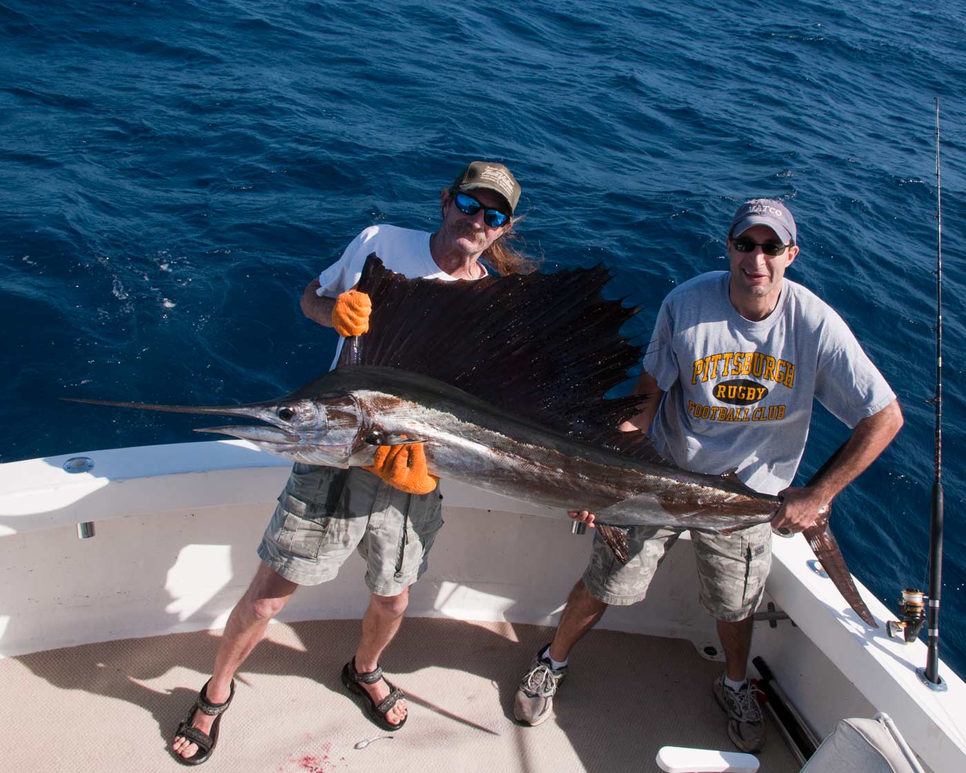 Kevin Groll and his fearless mate Captain Mike Hancock with Kevin's first sailfish, on his first sailfish trip!